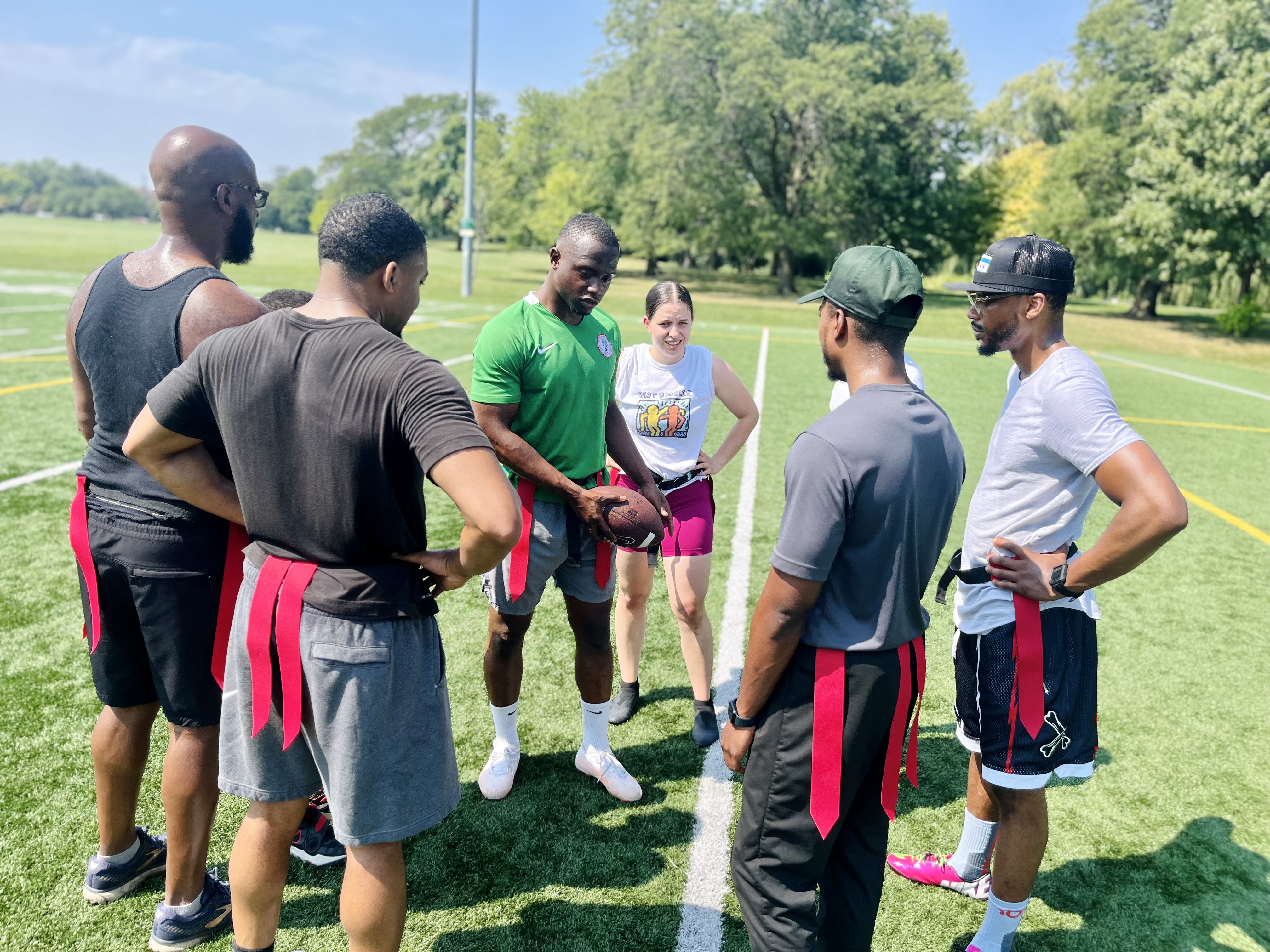 Flag football huddle
